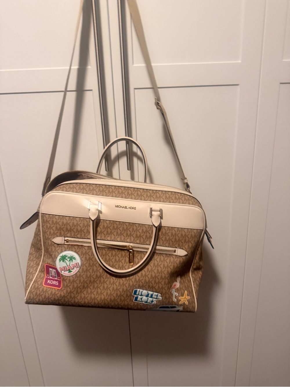 Michael Kors Tan Logo Travel Bag with Cream Trim and Playful Stickers
